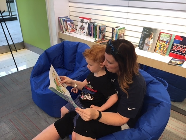 image of teacher and student reading